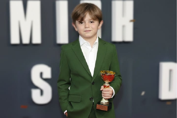 Callum Vinson, the American child actor cast as Atreus in the 2026 God of War series, posing for a professional photoshot.