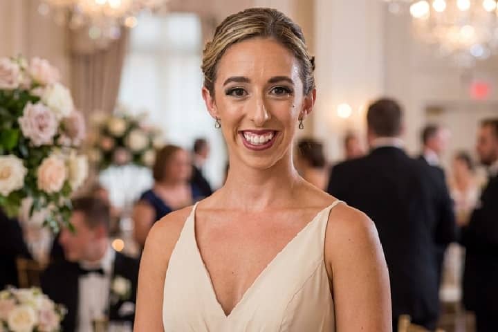 Katie Gaudreau-Joyce smiling at her July 2025 wedding reception at the Bellevue Hotel, representing the "Gaudreau Strong" legacy and her journey of resilience.